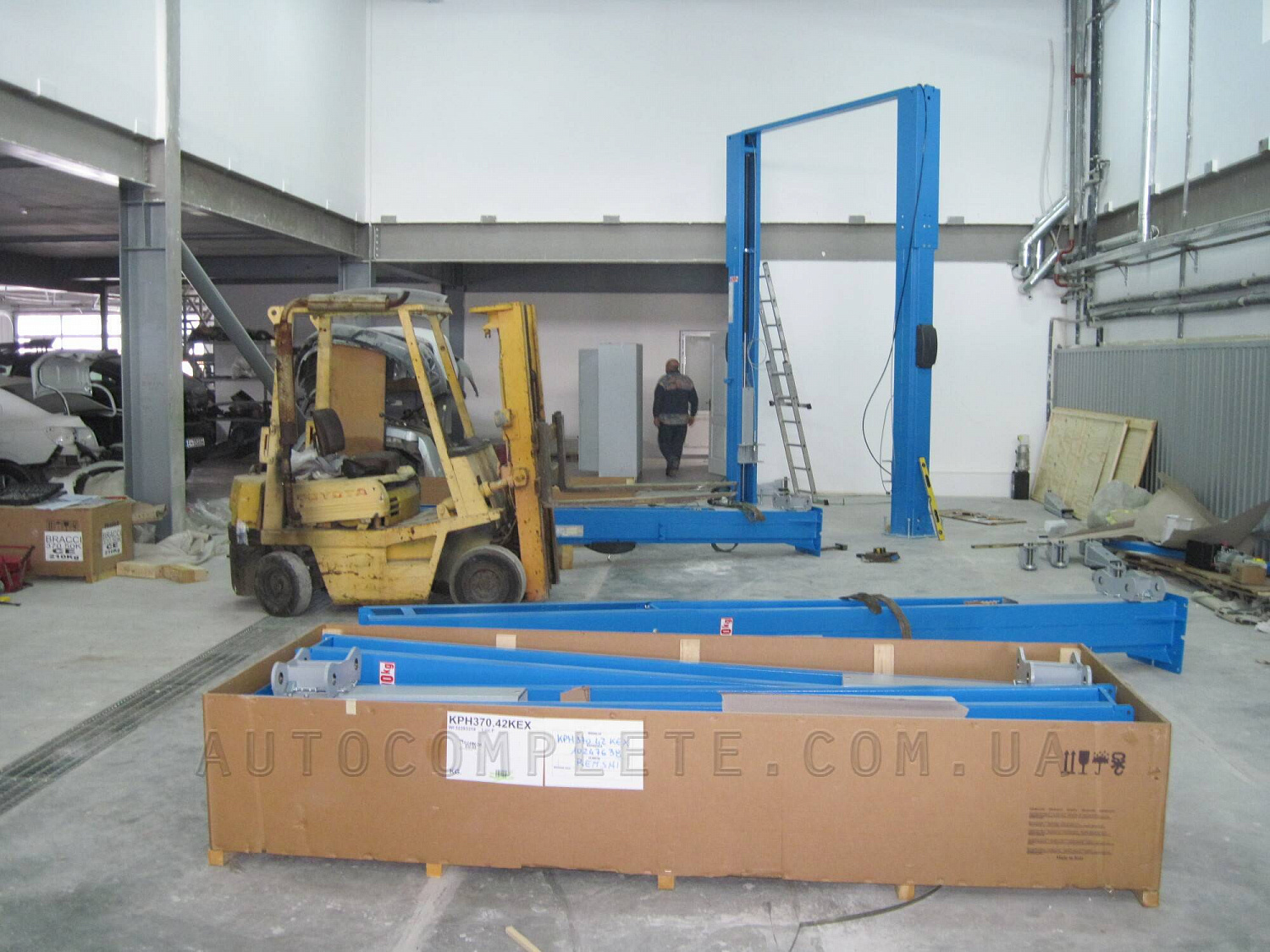 Монтаж двостійкового підйомника